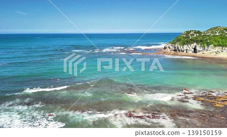 The stunning coastal landscape has clear water and rocky shores, ideal for relaxation and nature 139150159