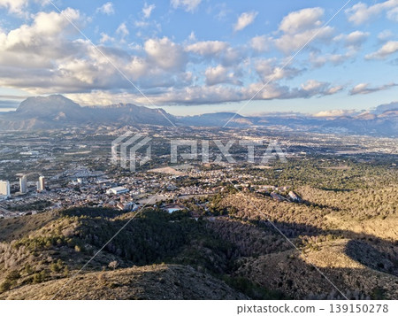 Sunshine highlights mountain and sea view, Golden hour illuminates valley with vibrant hues Sunshine highlights mountain and sea view, Golden hour illuminates valley with vibrant hues 139150278