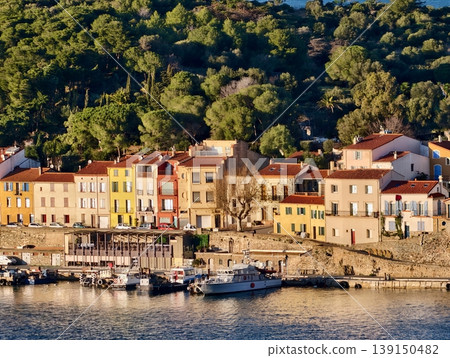 Lively coastal scenery. Vivid coastal landscape featuring shimmering reflections and inviting atmosphere Lively coastal scenery. Vivid coastal landscape featuring shimmering reflections and inviting atmosphere 139150482