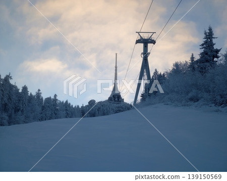 Dawn casts peaceful snowy scenes. Serene morning at mountain peak with untouched snow and tranquil air Dawn casts peaceful snowy scenes. Serene morning at mountain peak with untouched snow and tranquil air 139150569