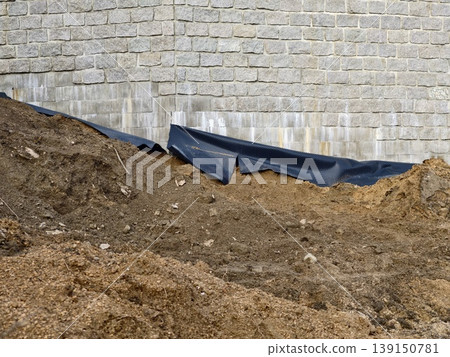 Site work details. Work site showing backfilled slope and drainage setup preparations ongoing Site work details. Work site showing backfilled slope and drainage setup preparations ongoing 139150781