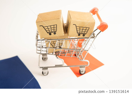 Online shopping, Shopping cart box on France flag, import export, finance commerce. Online shopping, Shopping cart box on France flag, import export, finance commerce. 139151614