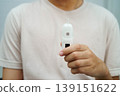 Man holding electronic cigarettes, no smoking. 139151622