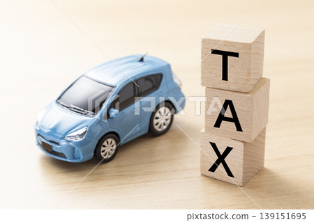 Blocks with "TAX" written on them and eco-cars Blocks with "TAX" written on them and eco-cars 139151695