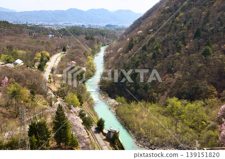 Kotaro Suspension Bridge and the cityscape of Omachi as seen from Omachi Dam, Omachi City, Nagano Prefecture 139151820