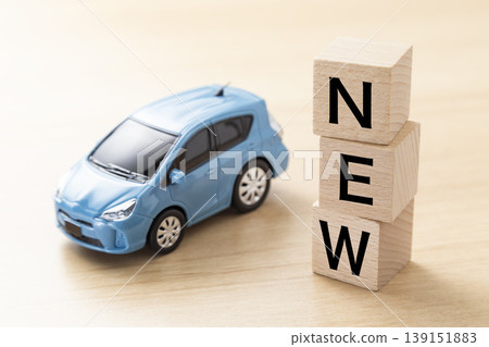 Blocks with "NEW" written on them and eco-cars Blocks with "NEW" written on them and eco-cars 139151883