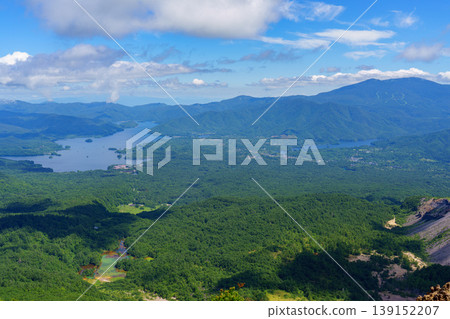 A spectacular view of Lake Hibara and the Ou Mountains from the Mount Bandai hiking trail: Natural scenery of Fukushima Prefecture A spectacular view of Lake Hibara and the Ou Mountains from the Mount Bandai hiking trail: Natural scenery of Fukushima Prefecture 139152207