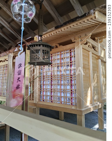 Wind chimes and wooden architecture at Suwa Grand Shrine Wind chimes and wooden architecture at Suwa Grand Shrine 139152303