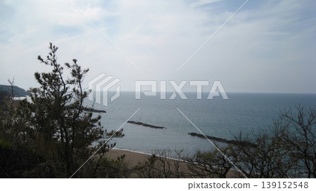 The sea, the sandy beach, and the cape as seen from the park on top of the cape. The sea, the sandy beach, and the cape as seen from the park on top of the cape. 139152548