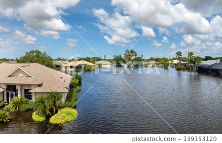 Tropical rainstorm flooded residential homes in suburban community in Florida. Hurricane aftermath Tropical rainstorm flooded residential homes in suburban community in Florida. Hurricane aftermath 139153120