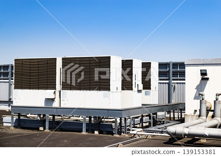 Air conditioner outdoor unit in rooftop parking lot 139153381