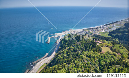 A view from the Sasagawa district of Asahi Town, Toyama Prefecture, towards Miyazaki Coast and Itoigawa. A view from the Sasagawa district of Asahi Town, Toyama Prefecture, towards Miyazaki Coast and Itoigawa. 139153535
