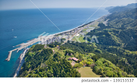 A view from the Sasagawa district of Asahi Town, Toyama Prefecture, towards Miyazaki Coast and Itoigawa. A view from the Sasagawa district of Asahi Town, Toyama Prefecture, towards Miyazaki Coast and Itoigawa. 139153537