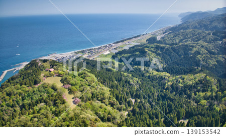 A view from the Sasagawa district of Asahi Town, Toyama Prefecture, towards Miyazaki Coast and Itoigawa. A view from the Sasagawa district of Asahi Town, Toyama Prefecture, towards Miyazaki Coast and Itoigawa. 139153542