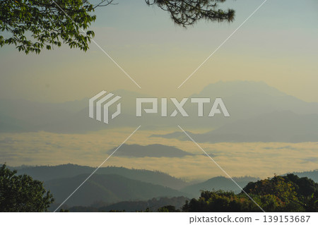 sunrise with moving of cloud and clear sky and layer of mountain sunrise with moving of cloud and clear sky and layer of mountain 139153687