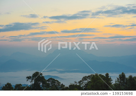sunrise with moving of cloud and clear sky and layer of mountain sunrise with moving of cloud and clear sky and layer of mountain 139153698