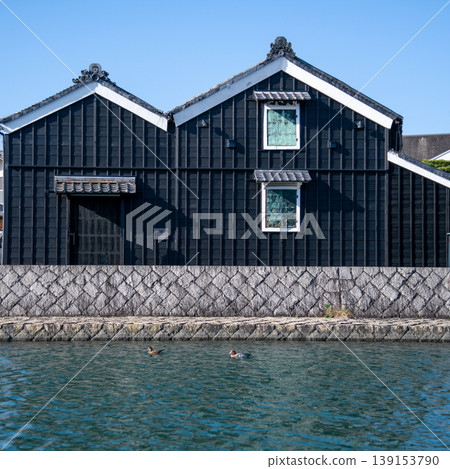 Mie Prefecture, Ise City: Setagawa River and the townscape of Ise Kawasaki - an image of storehouses and a river. Mie Prefecture, Ise City: Setagawa River and the townscape of Ise Kawasaki - an image of storehouses and a river. 139153790