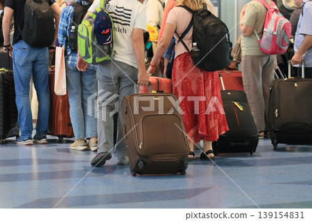 International passengers heading to the international counter at Haneda Airport's international terminal International passengers heading to the international counter at Haneda Airport's international terminal 139154831