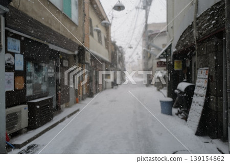 Snow falling street corner Snow falling street corner 139154862