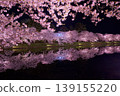 Cherry blossoms at night along the moat of Hirosaki Castle 139155220