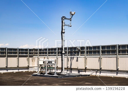 Equipment on the roof of a commercial building Equipment on the roof of a commercial building 139156228