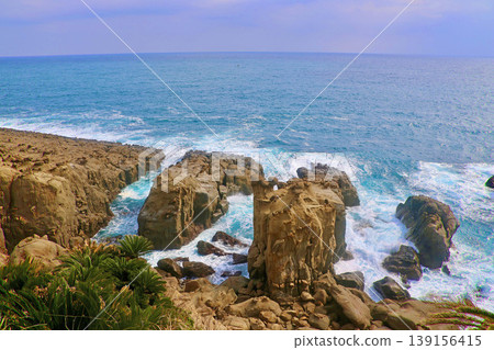 Unusual rock formations and boulders at Udo Shrine (Nichinan City, Miyazaki Prefecture) 139156415