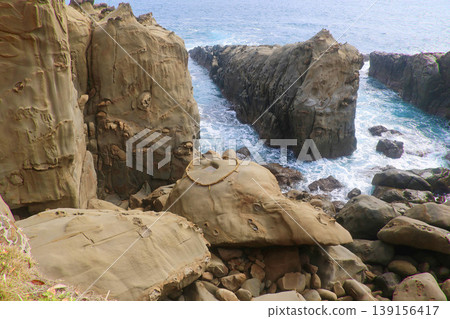 Unusual rock formations and boulders at Udo Shrine (Nichinan City, Miyazaki Prefecture) 139156417