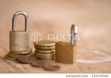 Padlock on Stack of Euro Coins for Financial Security Concept 139156560