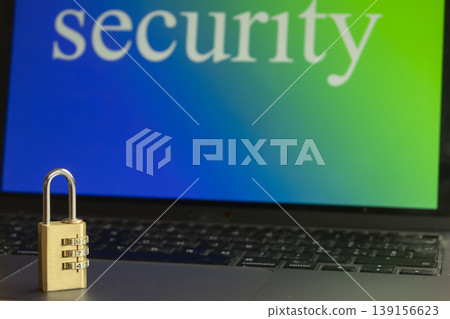 Data security padlock on laptop keyboard with screen background Data security padlock on laptop keyboard with screen background 139156623