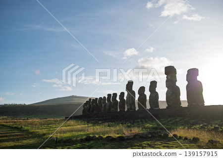 Mysterious moai statue on easter island chile standing in bright sun Mysterious moai statue on easter island chile standing in bright sun 139157915