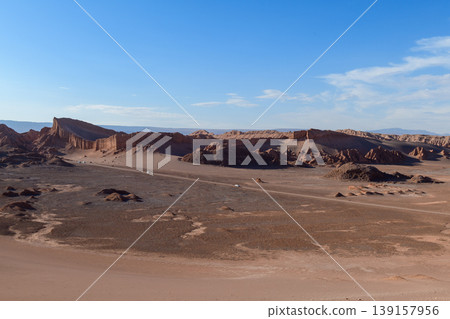 Majestic Valle de la Luna desert landscape in Atacama with rock formation and blue sky Majestic Valle de la Luna desert landscape in Atacama with rock formation and blue sky 139157956