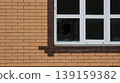 A broken lower corner of a window in an uninhabited new house with dusty glass and a dark, empty interior, as a symbol of crime, theft, violence or destruction of the cottage. 139159382
