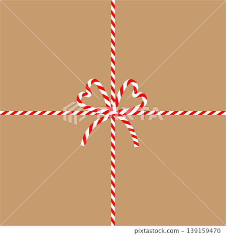 Square craft brown background with candy cane ribbon. Christmas packing string for decoration and present Square craft brown background with candy cane ribbon. Christmas packing string for decoration and present 139159470
