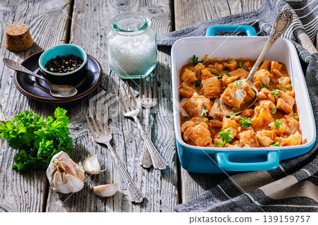 Indian fish curry with cauliflower and green peas 139159757