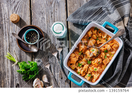 Indian fish curry with cauliflower and green peas Indian fish curry with cauliflower and green peas 139159764