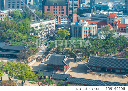 Seoul, South Korea - Apr. 12 , 2026 : Aerial view of Deoksugung Palace with modern skyscrapers in Seoul, South Korea 139160306