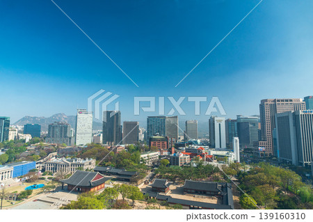 Seoul, South Korea - Apr. 12 , 2026 : Aerial view of Deoksugung Palace with modern skyscrapers in Seoul, South Korea 139160310