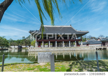 Seoul, South Korea - Apr. 12 , 2026 : Gyeonghoeru Pavilion in Gyeongbokgung Palace with cherry blossoms in Spring, Seoul, South Korea 139160605
