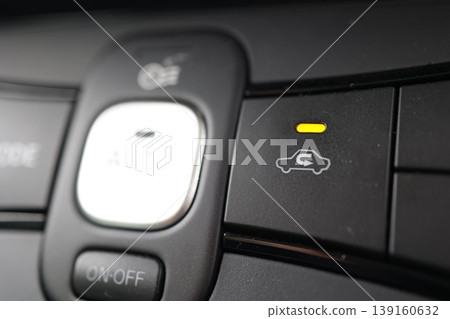 Car air conditioning internal circulation switch button. Yellow light included. Close-up. Car air conditioning internal circulation switch button. Yellow light included. Close-up. 139160632