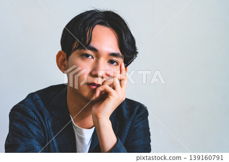 A man with a thoughtful expression 139160791
