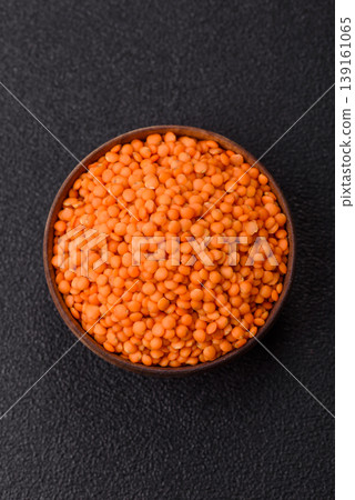 Raw red lentils as a source of protein for a healthy vegan meal. Red lentils 139161065