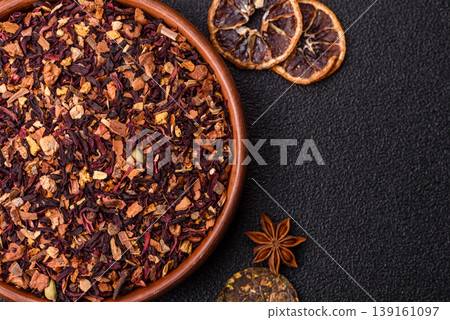 Dry herbal or fruit tea with flower petals and aromatic additives. Dry fruit herbal tea Dry herbal or fruit tea with flower petals and aromatic additives. Dry fruit herbal tea 139161097