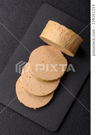 Foie gras, sliced chicken liver with fruit jam for French toast. Foie gras Foie gras, sliced chicken liver with fruit jam for French toast. Foie gras 139161154
