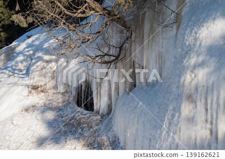 Icefall with branches and icicles in winter day in Lavia, Finland 139162621