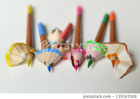 Row colored pencils with decorative shavings minimal back to school Row colored pencils with decorative shavings minimal back to school 139163508
