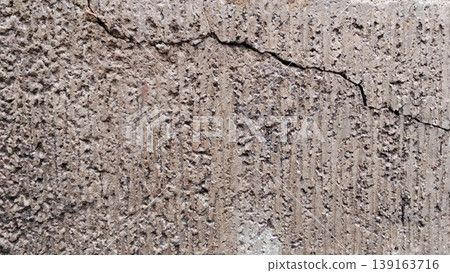 Cracked and Dull Concrete Wall Texture with Rough Details 139163716