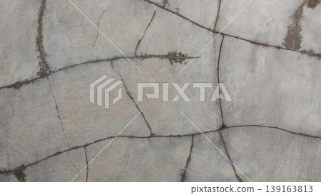 Cracked Concrete Wall Texture with Abstract Pattern Cracked Concrete Wall Texture with Abstract Pattern 139163813