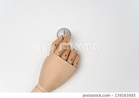 Hand mannequin gripping a thumb turn Hand mannequin gripping a thumb turn 139163985