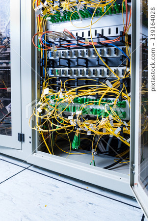 server rack with switch boards and cables server rack with switch boards and cables 139164028