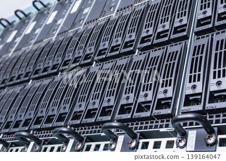 cluster of data storage SSD hard drives inside server rack cluster of data storage SSD hard drives inside server rack 139164047